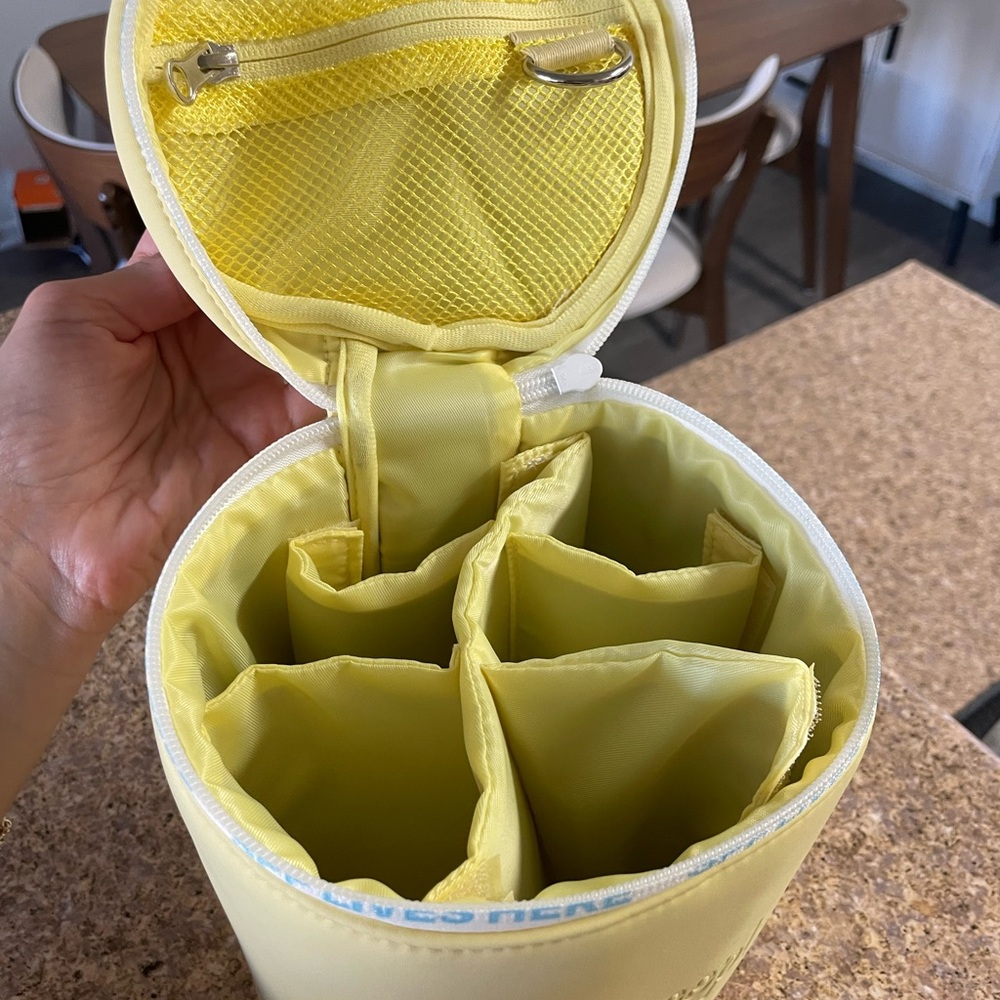 Supergoop Yellow travel container